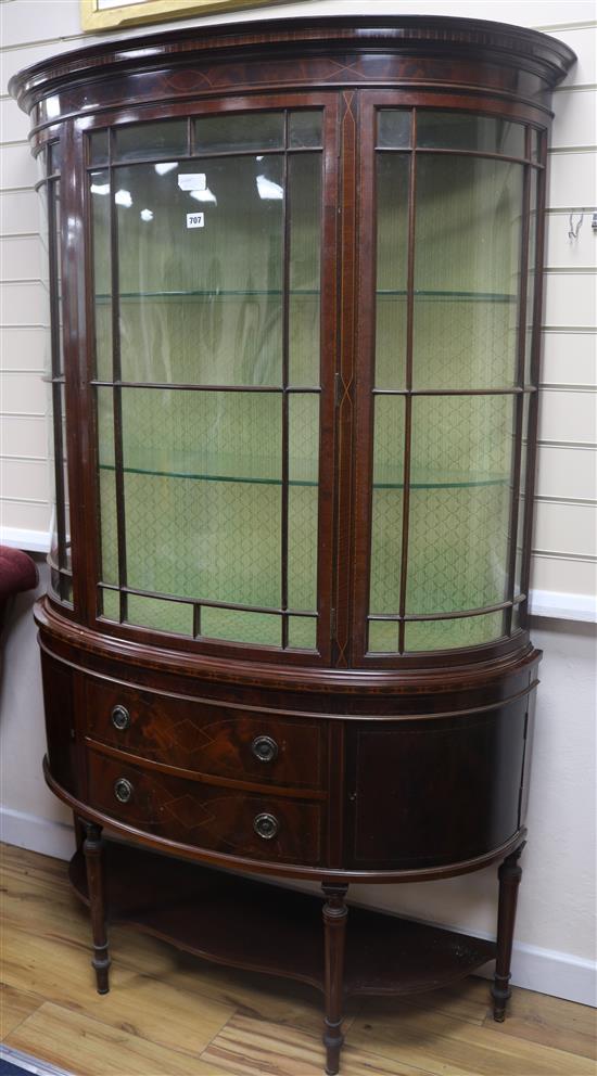 An Edwardian inlaid bow-front mahogany display cabinet, H.181cm